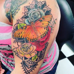 Negocio Bison Tattoos & Piercings
