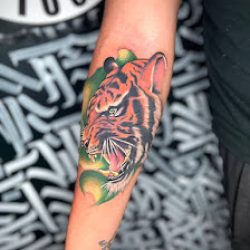 Negocio Inkaholik Tattoos
